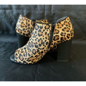 Open toe high heeled boots by Moda Spana